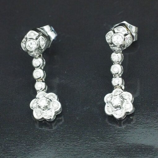 Pendientes largos rosetones de brillantes 0,80 Ctes