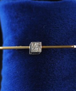 Broche Art Decó con brillantes y zafiros sintéticos. Montado en oro de 18 Ktes.