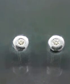 Pendientes solitarios de brillantes. Montados en oro blanco de 18 Ktes.