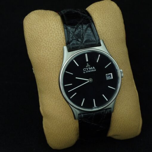 Reloj Cyma By Synchron de caballero. Acero con pulsera de piel. Cuerda. Esfera negra.