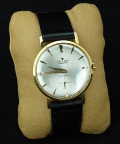 Reloj Radiant de caballero. Oro de 18 Ktes con pulsera de piel. Cuerda.