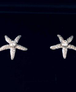 Pendientes estrella con diamantes y talla brillante central