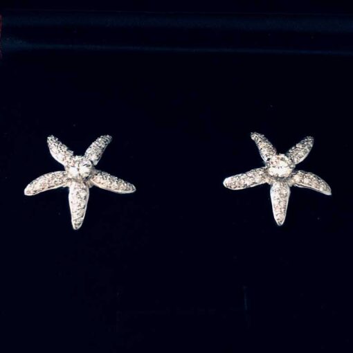 Pendientes estrella con diamantes y talla brillante central