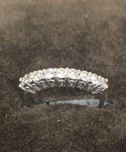 Sortija modelo cintillo con 9 brillantes oro blanco 18 Ktes.