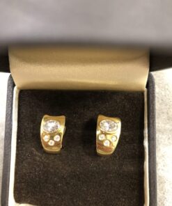 Pendientes circonitas montados en oro amarillo 18ktes