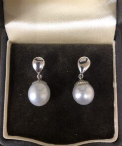 Pendientes perla Australiana montados en oro blanco de ley 18kts