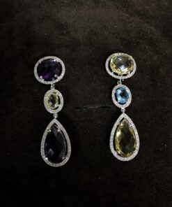 Pendientes con amatistas y topacios amarillos y azules con orla  de brillantes montado en oro blanco  de ley 18kts