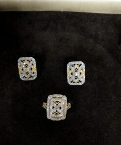 Juegos de pendientes y sortija  con brillantes montado en oro bicolor de ley 18kts