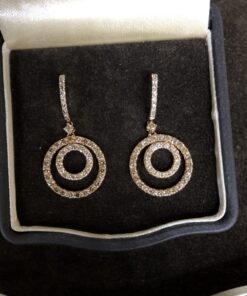 Pendientes con forma doble aro colgante y brillantes  montado en oro amarillo de ley  18kts