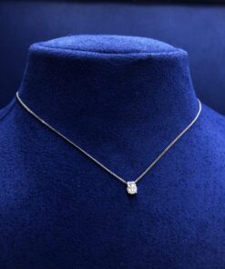 Colgante solitario brillante 0,24 cts con cadena barbada en oro blanco de ley 18 kts.