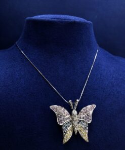 Cadena con colgante mariposa y brillantes montado en oro blanco de ley 18kts