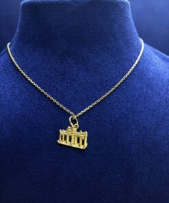 Cadena con colgante puerta de alcalá  montada en oro blanco de ley 18kts