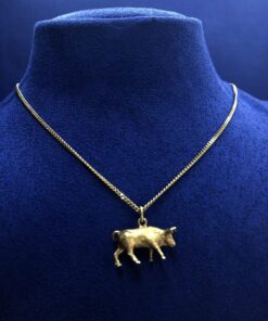 Cadena  con colgante toro  montado en oro  amarillo de ley 18kts