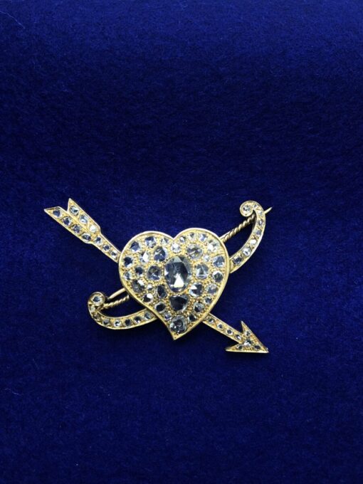 Broches corazón forma cupido con diamantes 2,5 cts montado en oro amarillo de ley 18kts