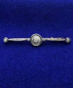 Broche con brillantes  montado en oro bicolor de ley 18kts