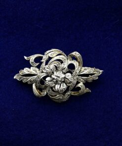 Broche con brillantes 1,30 cts montado en oro blanco de ley 18kts