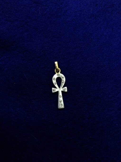 Colgante cruz de la vida eterna montado en bicolor de ley 18kts