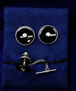 Gemelos con onix y brillante central montado en oro blanco de ley 18kts