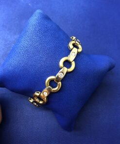 Pulsera con aros y brillantes 1,10 cts montado en oro amarillo de ley 18kts