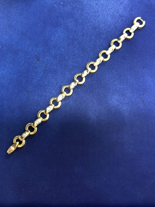Pulsera con aros y brillantes 1,10 cts montado en oro amarillo de ley 18kts - Imagen 2