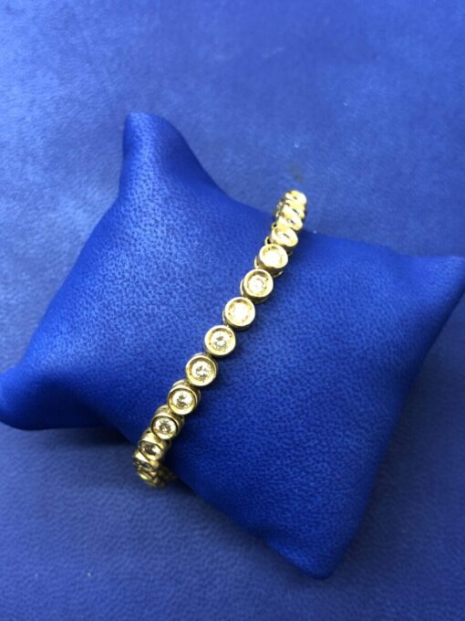 Pulsera con brillantes 6,25 cts montado  en oro amarillo de ley 18kts