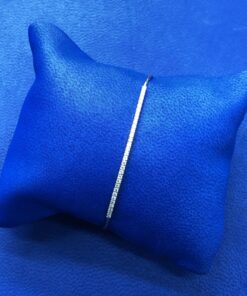 Pulsera caña con brillantes ,030 cts montado en oro amarillo de ley 18kts