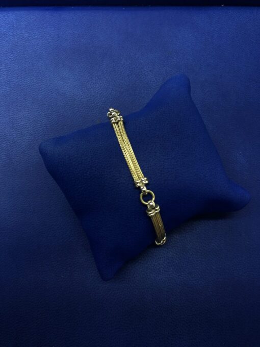 Pulsera montada en oro amarillo de ley 18kts