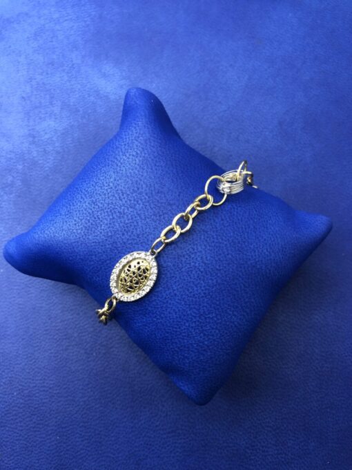 Pulsera con circonitas montada en oro bicolor de ley 18 kts