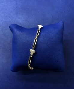 Pulsera con cinco tréboles montado en oro bicolor de ley 18kts