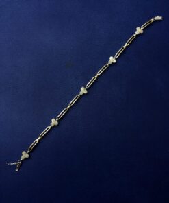 Alternative view of Pulsera con cinco  tréboles  montado en  oro bicolor de ley 18kts