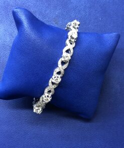 Pulsera forma infinito con brillantes 6,10cts montado en oro blanco de ley 18kts