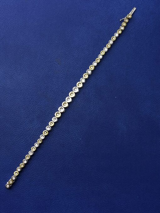 Pulsera con círculos con brillantes 1cts montado en oro bicolor de ley 18kts - Imagen 2