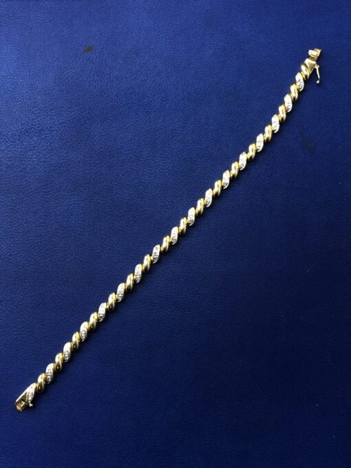 Pulsera espiral  montado en oro bicolor de ley 18kts - Imagen 2
