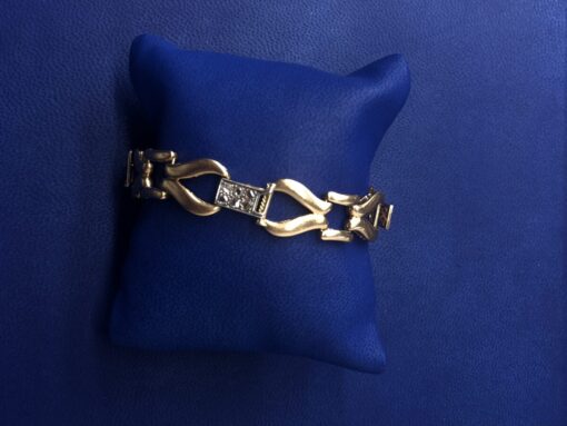 Pulsera con zafiros reconstituidos y brillantes 0,40cts montado en oro bicolor de ley 18kts