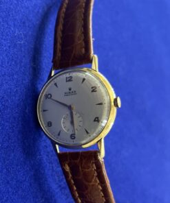 Reloj Rolex Vintage Precisión con correa de cuero marrón, montado en oro amarillo de 18 kts. De cuerda manual