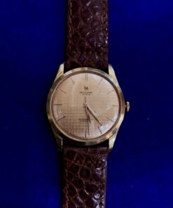 RELOJ AUTOMÁTICO UNIVERSAL GENEVE DE ORO 18 KTS. CON PULSERA DE PIEL UNISEX