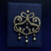 BROCHE DE LA BELLE ÉPOQUE CON BRILLANTES 1,70CTS. MONTADO EN ORO AMARILLO Y PLATINO.