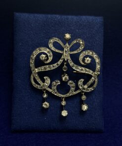 BROCHE DE LA BELLE ÉPOQUE CON BRILLANTES 1,70CTS. MONTADO EN ORO AMARILLO Y PLATINO.