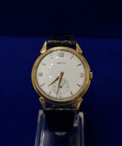 Reloj Zenith de cuerda, en oro 18 kts con pulsera de piel. Año 1958