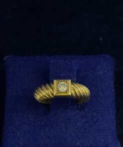 Sortija con brillante 0,20 cts montada en oro amarillo de ley 18 kts