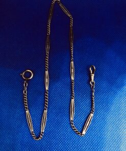 Leontina para reloj de bolsillo montada en oro amarillo de ley 18 kts.