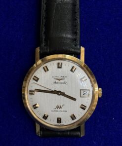 Reloj Longines automático en oro de ley 18kts con correa de cuero negra