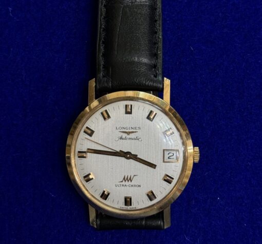 Reloj Longines automático en oro de ley 18kts con correa de cuero negra
