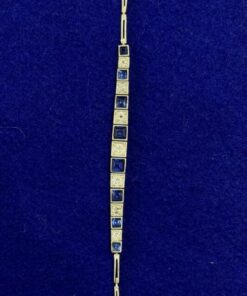 Pulsera bicolor Art-Decó con brillantes y zafiros sintéticos. En oro de ley 18kts.