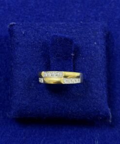 SORTIJA BICOLOR CON BRILLANTES 0,25CTS. MONTADA EN ORO DE LEY 18KTS.