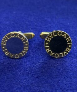 Gemelos Bulgari redondos montados en oro bicolor de ley 18kts.