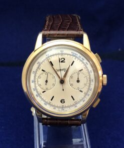 RELOJ EBERHARD DE CUERDA, VINTAGE, 41mm, PULSERA DE CUERO MARRÓN, EN ORO 18KTS. AÑO APROX. 1950