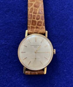 RELOJ VACHERON CONSTANTIN DE CUERDA, CON PULSERA DE CUERO MARRÓN. EN ORO 18KTS.