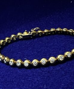 PULSERA RIVIERE CHATON DE BRILLANTES 1,96CTS. MONTADA EN ORO AMARILLO DE LEY 18KTS.