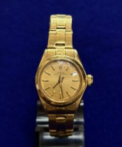 Rolex oyster perpetual con esfera champán. Montado en oro de ley 18kts.